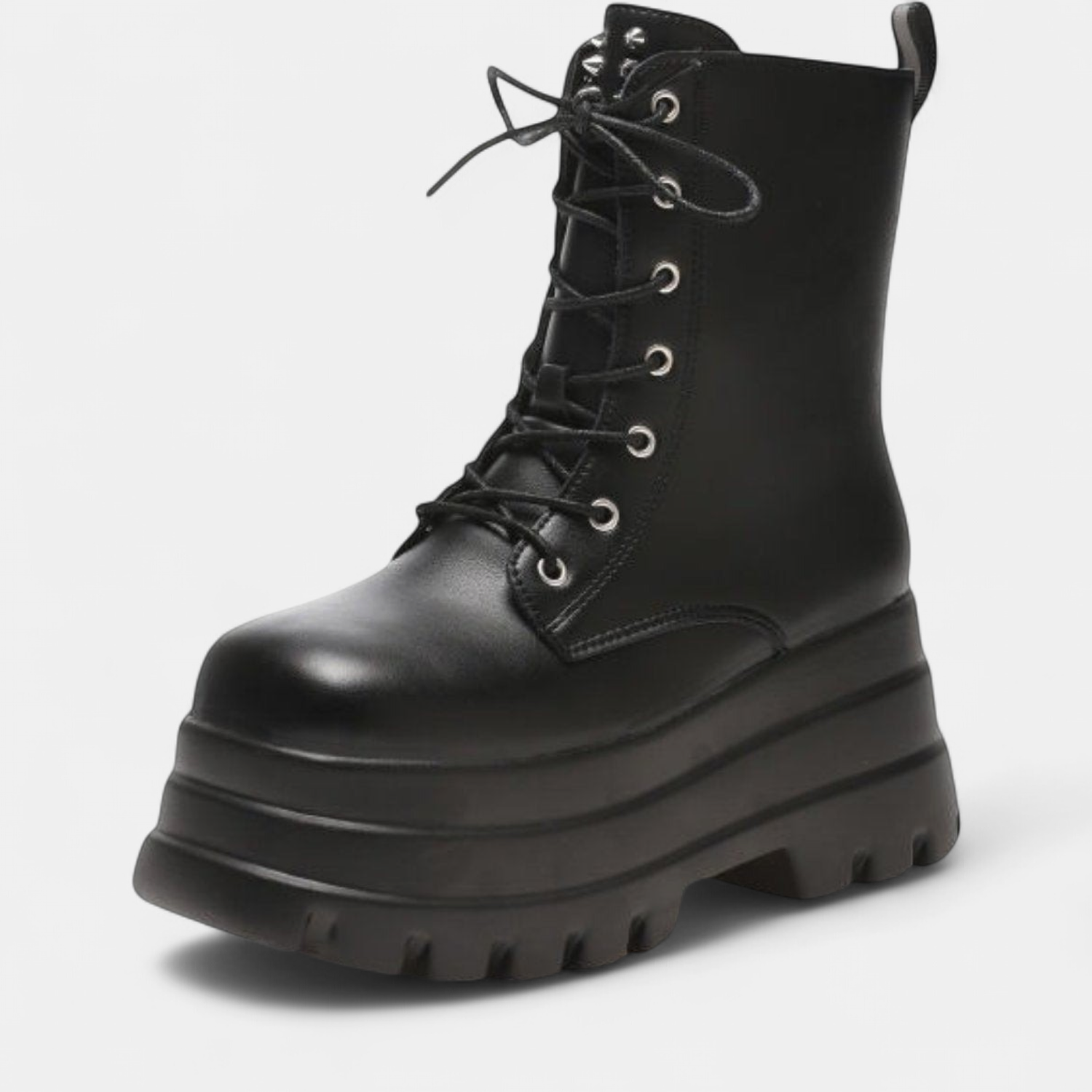 Lace up front and eyelet detail of the combat ankle boot