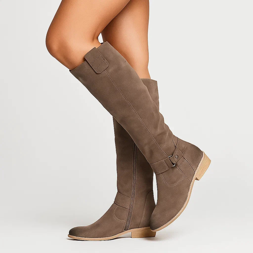 Brown suede pair angled to show the low block heel