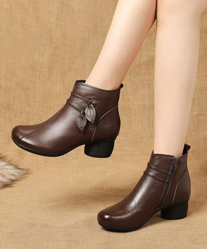 Chunky heel boots worn with jeans, full-length styling shot