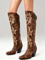 Cowgirl boots for women in brown embroidered leather, side view of the pair