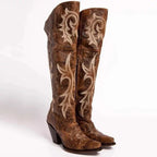Side zipper entry on the brown leather cowgirl boot