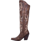 Cowgirl boots for women worn with denim, full-length styled view