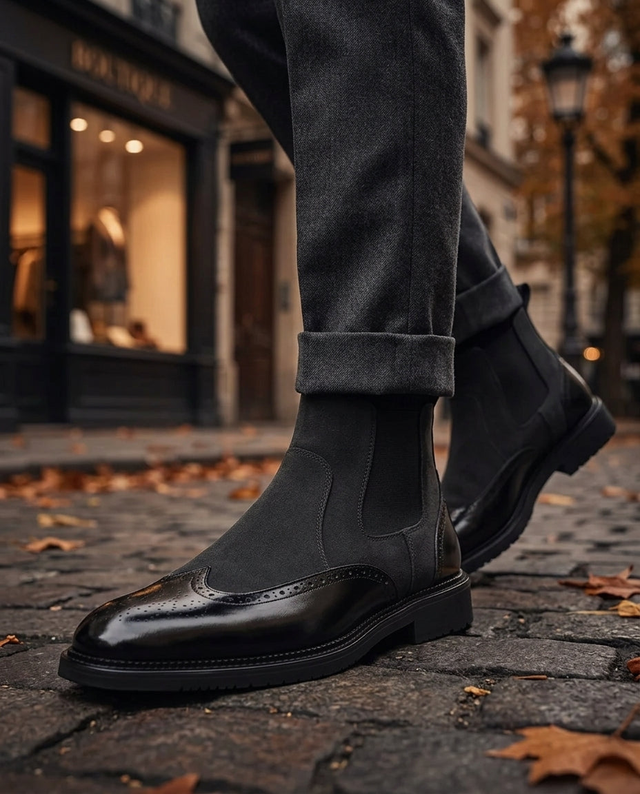 Men's suede brogue Chelsea boot in Black, shown against a plain studio background