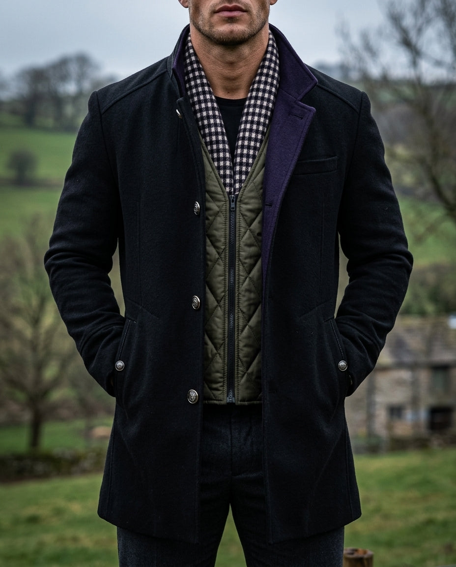 Men's tailored wool coat in Black, shown against a plain studio background