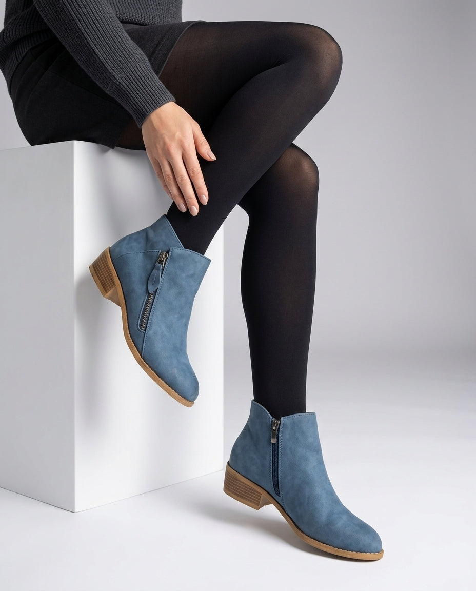 Block heel ankle boot in Blue, shown against a plain studio background