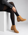 Block heel ankle boot in Brown, shown against a plain studio background