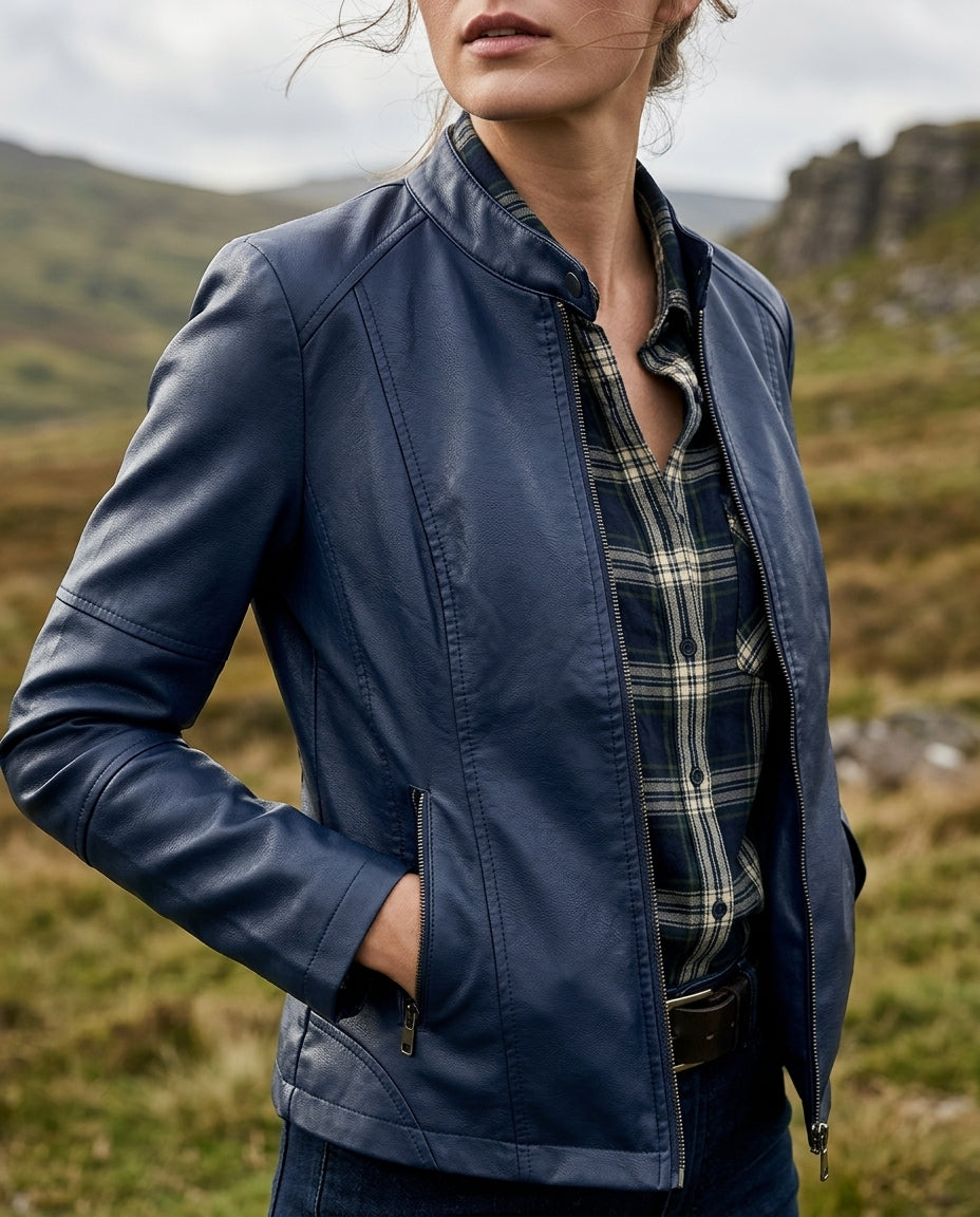 Cropped faux leather moto jacket in Blue, shown against a plain studio background