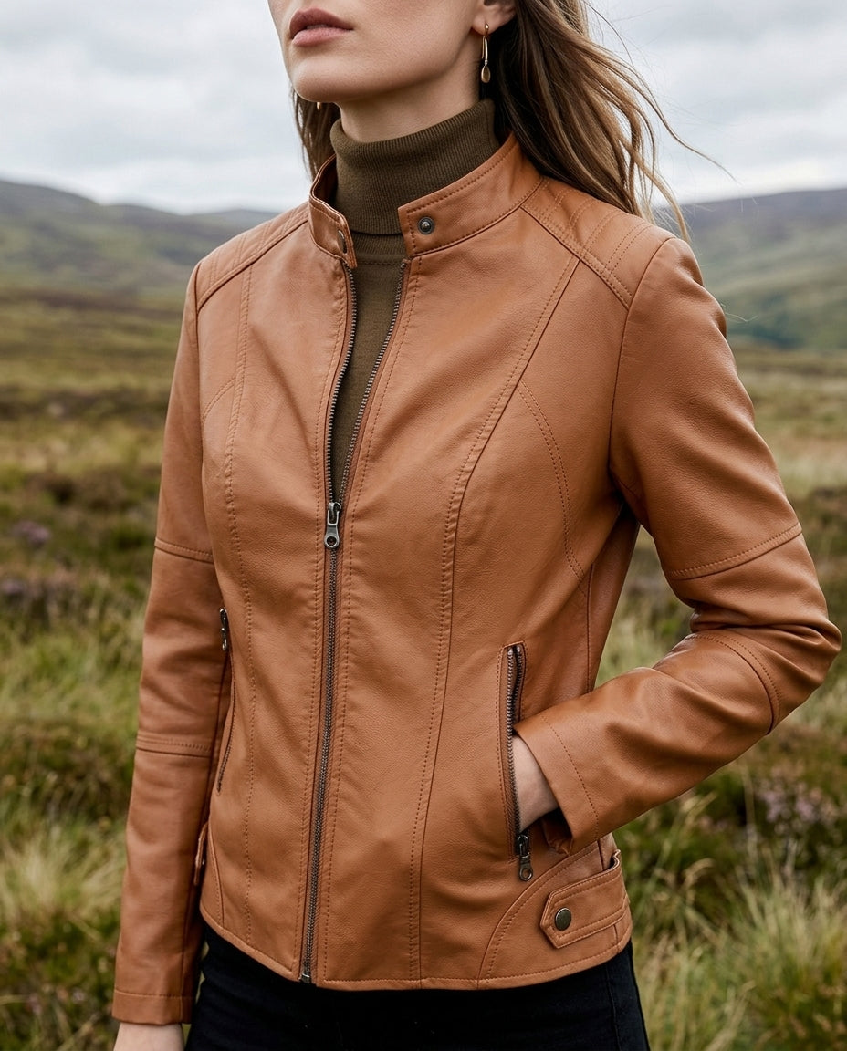 Cropped faux leather moto jacket in Cognac, shown against a plain studio background