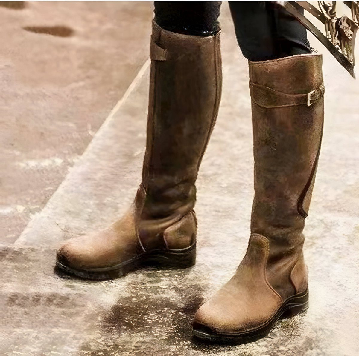 Mid brown leather boot in profile, showing the smooth grain of the upper