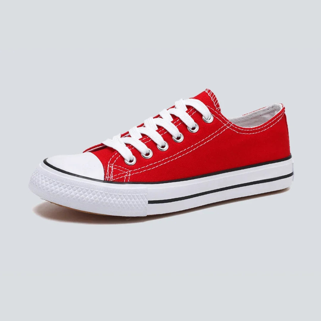 Canvas sneakers for women in bright red, pair shown from the side