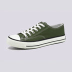 Canvas sneakers for women in green, low top side profile