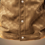 Detail of the chest pocket and plaid suede texture on the men's shirt jacket