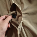 Men's winter coat, detail of the pockets and cuff