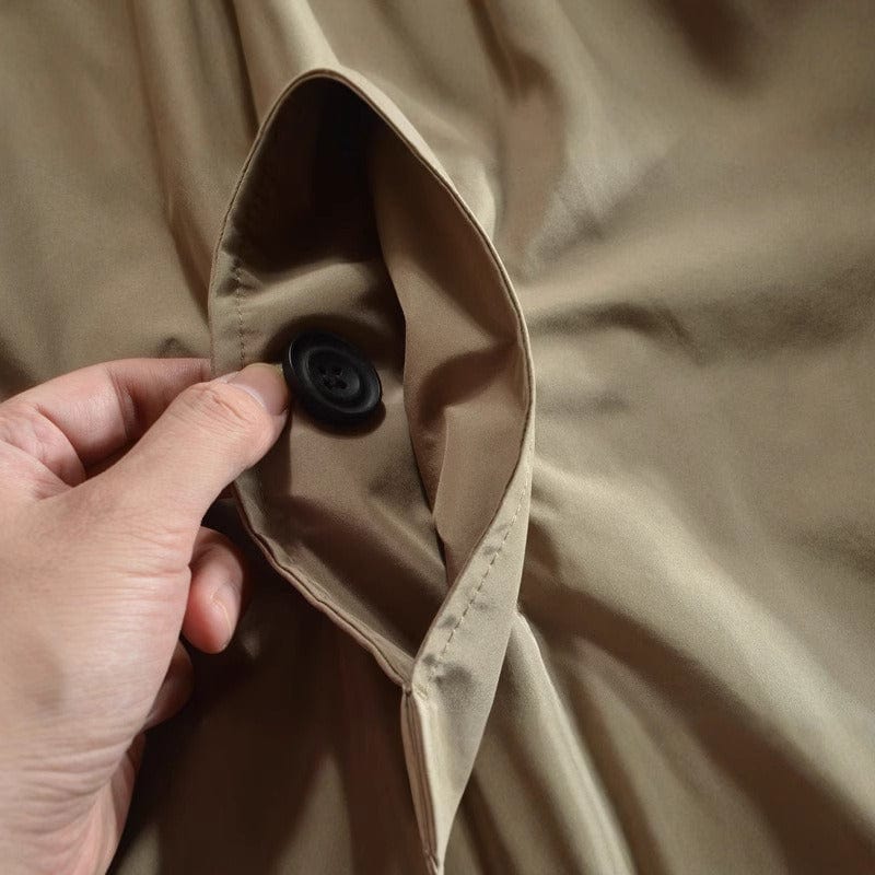 Men's winter coat, detail of the pockets and cuff