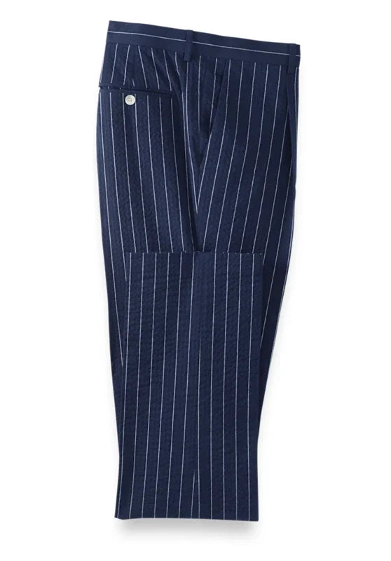 Men's pinstripe dress pants, detail of the button waistband and zip closure