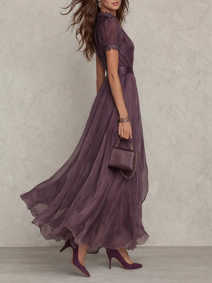 Purple midi dress, three-quarter view of the skimming fit through the body