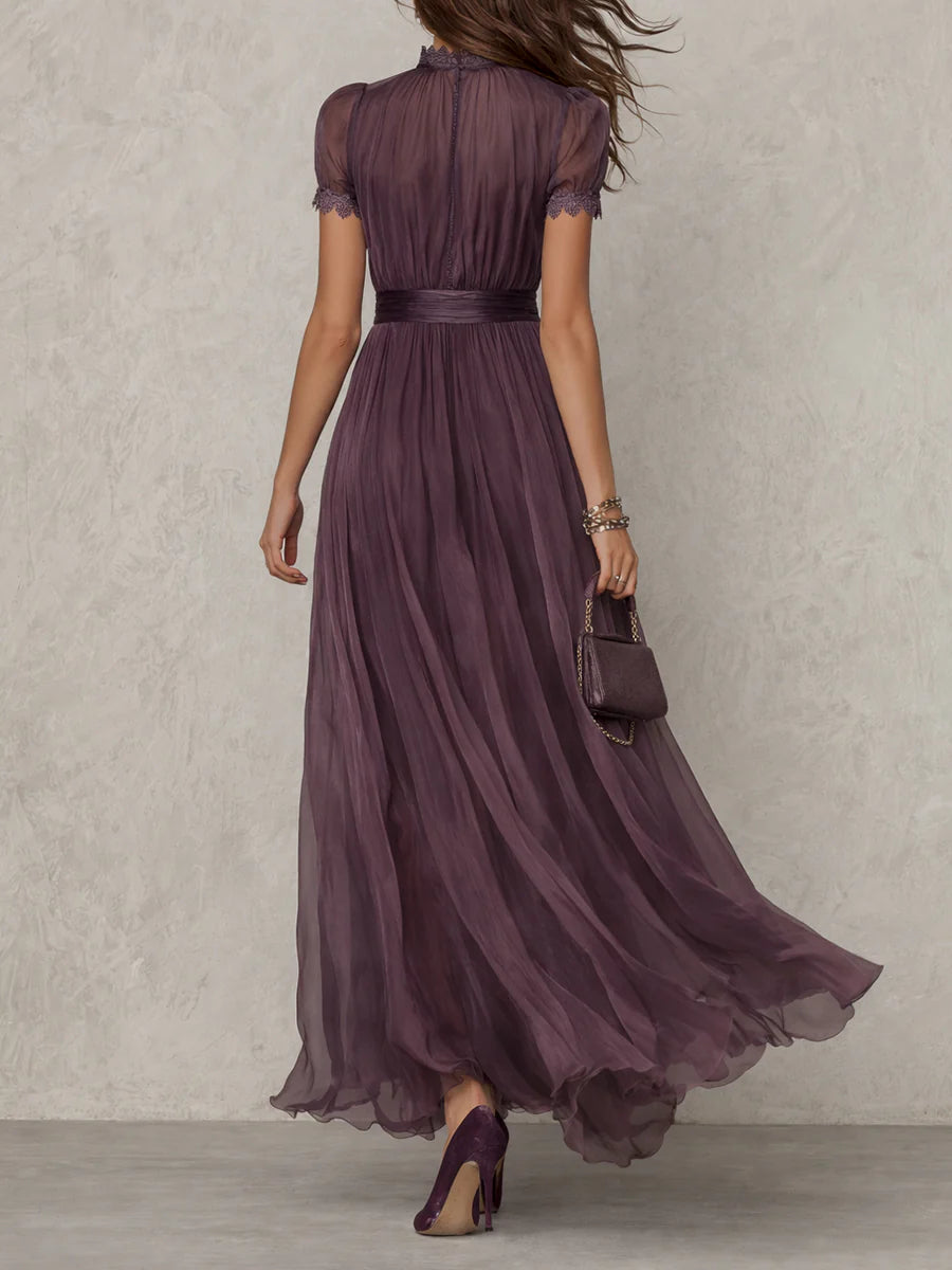 Purple midi dress, back view showing the clean unadorned cut
