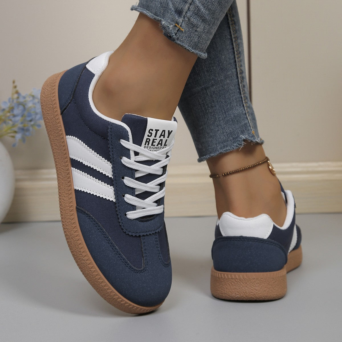 Cushioned walking shoes for women shown worn on a pavement walk
