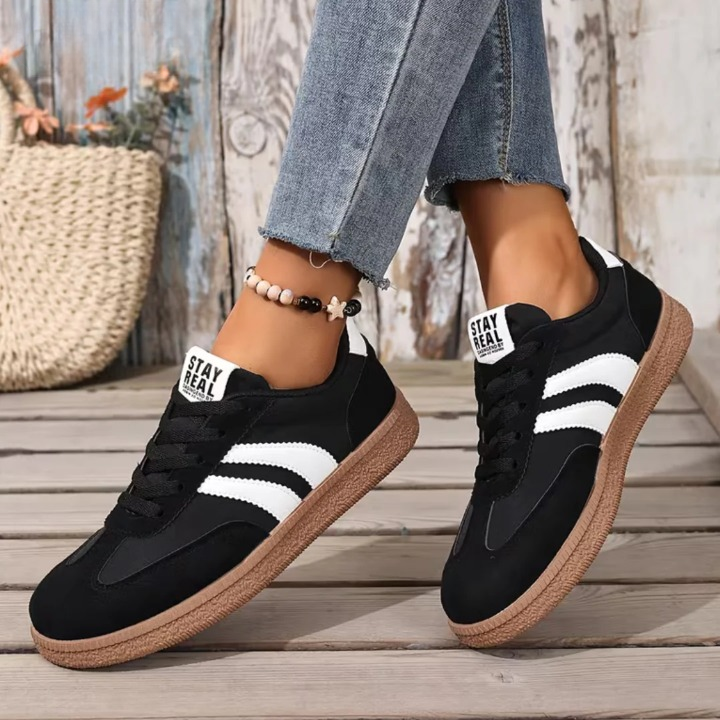 Black cushioned walking shoes for women, side profile