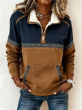Quarter zip pullover for women in navy and brown, sherpa collar and kangaroo pocket shown from the front