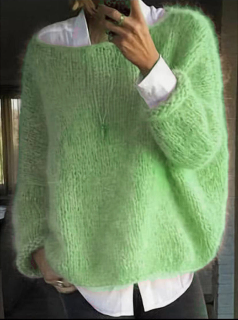 Oversized mohair sweater for women in green, flat lay showing the balloon sleeves
