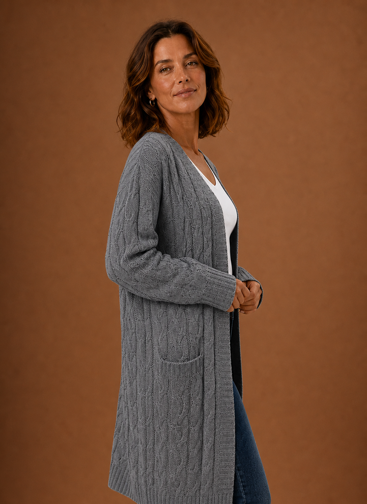 Grey cardigan angled to show sleeve drape and the chunky knit gauge