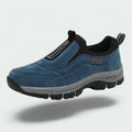 Blue slip on sneakers for men, side profile of the loafer cut