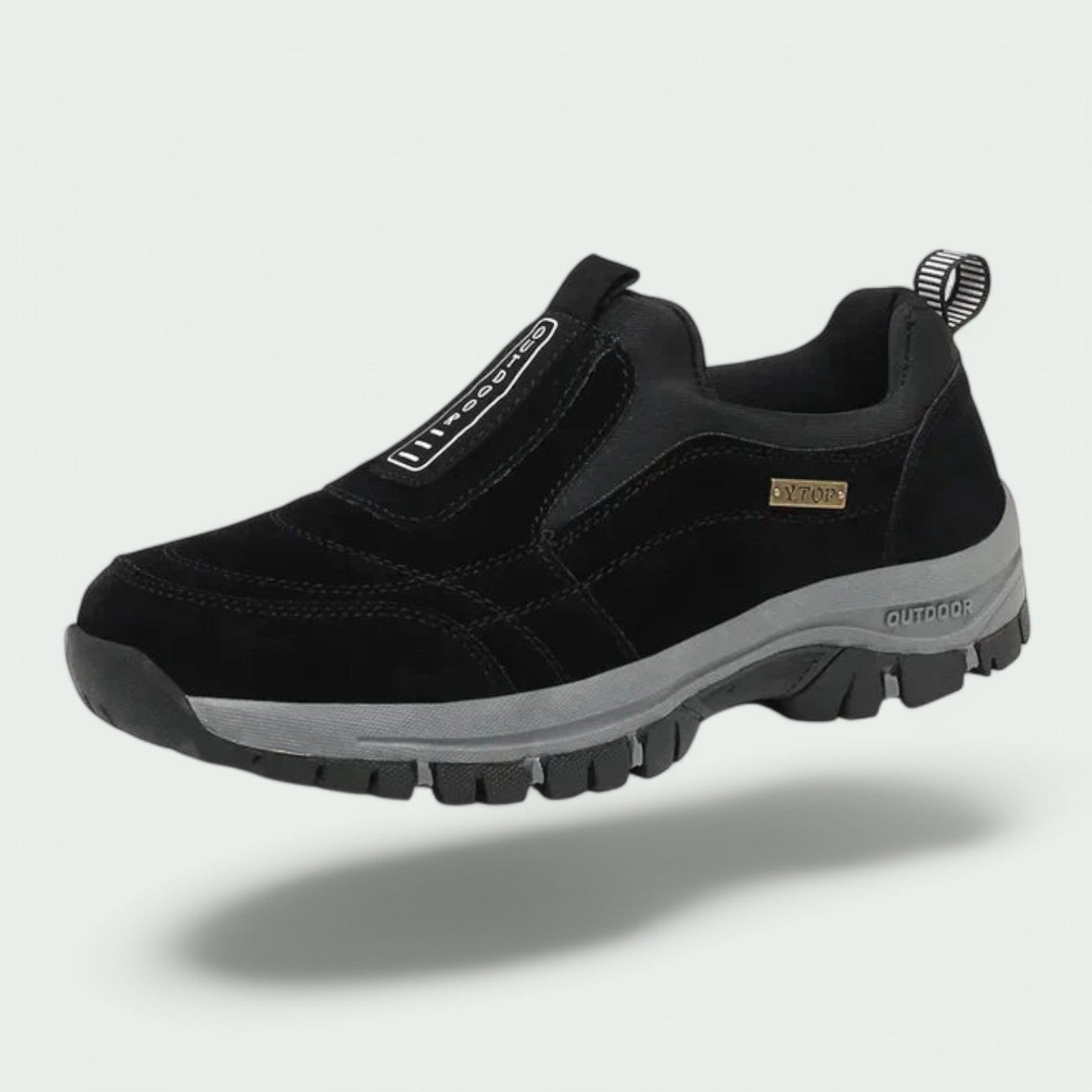 Black slip on sneakers for men, side profile of the loafer cut