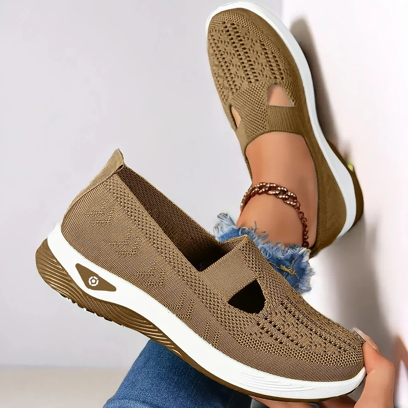 Slip on walking shoes for women, view of the embossed rubber outsole and round toe box