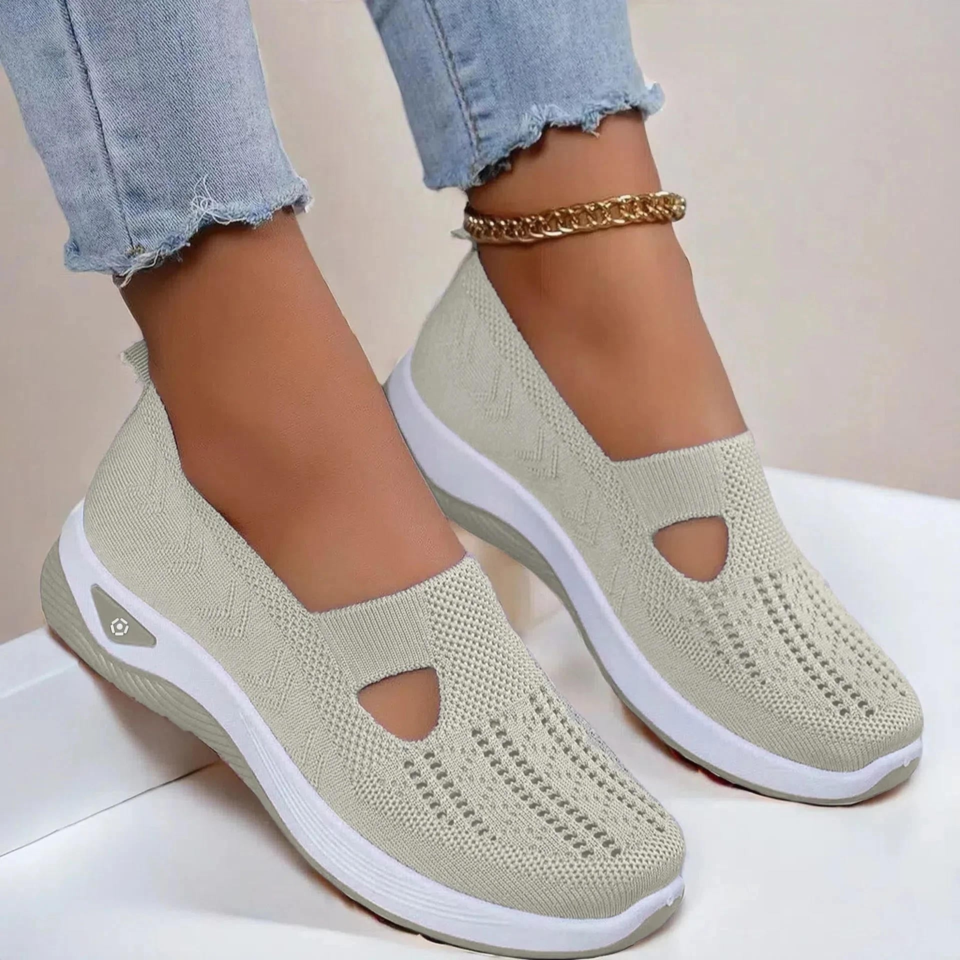 Beige slip on walking shoes for women, side view
