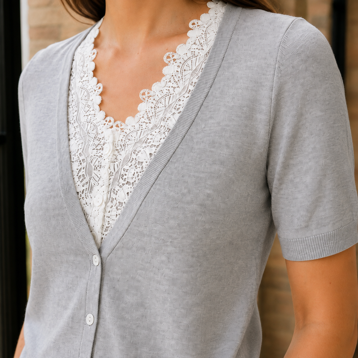 Light gray lace-trim sweater, close range on the weave and surface texture