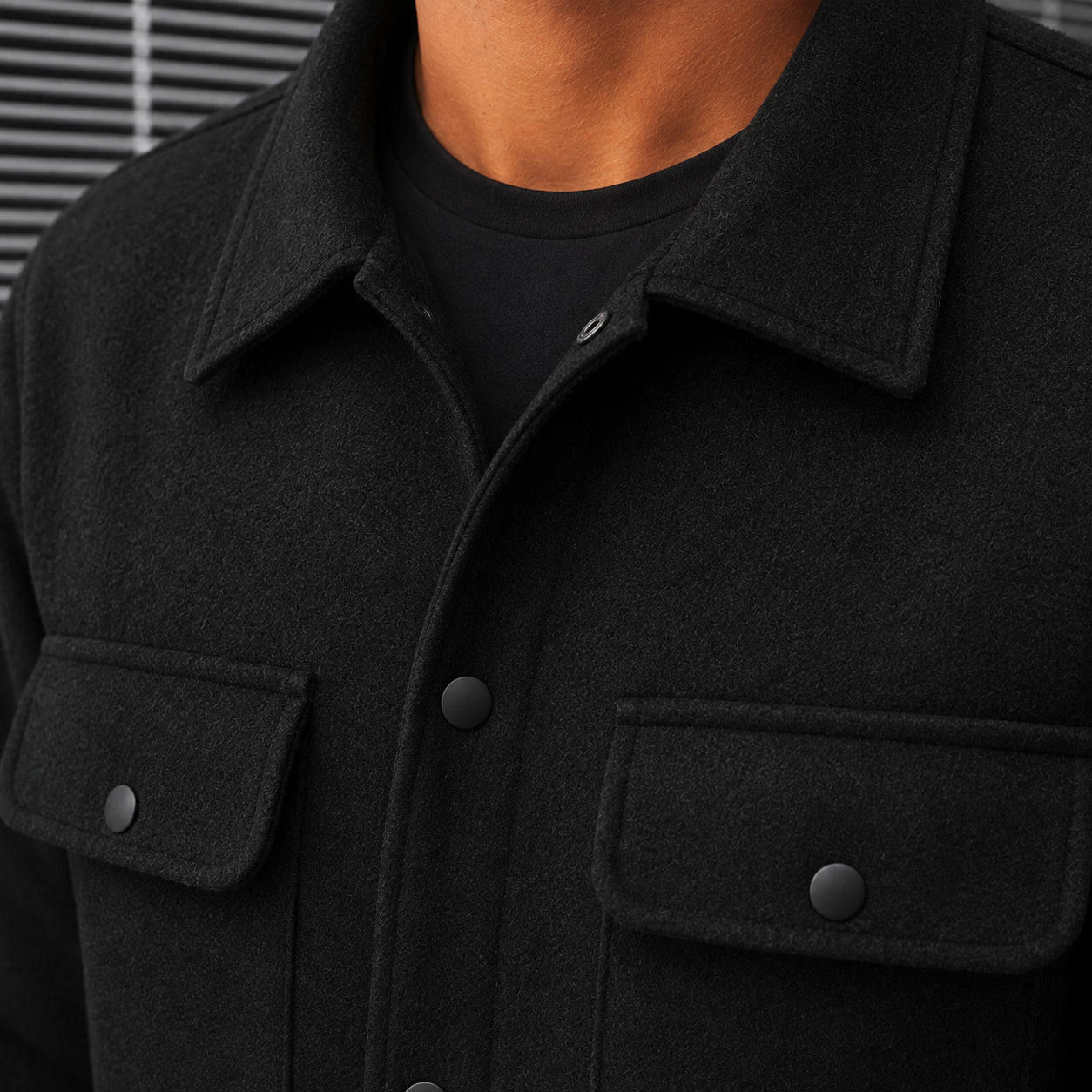 The men's utility jacket seen from a second angle, collar open