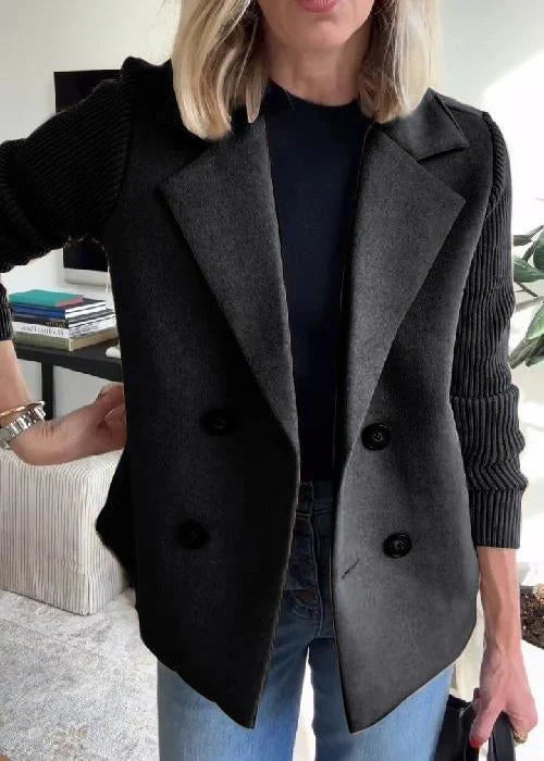 Black mid-length tailored coat for women, front view