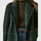 Dark green plaid coat for women, detail of the structured lapel collar