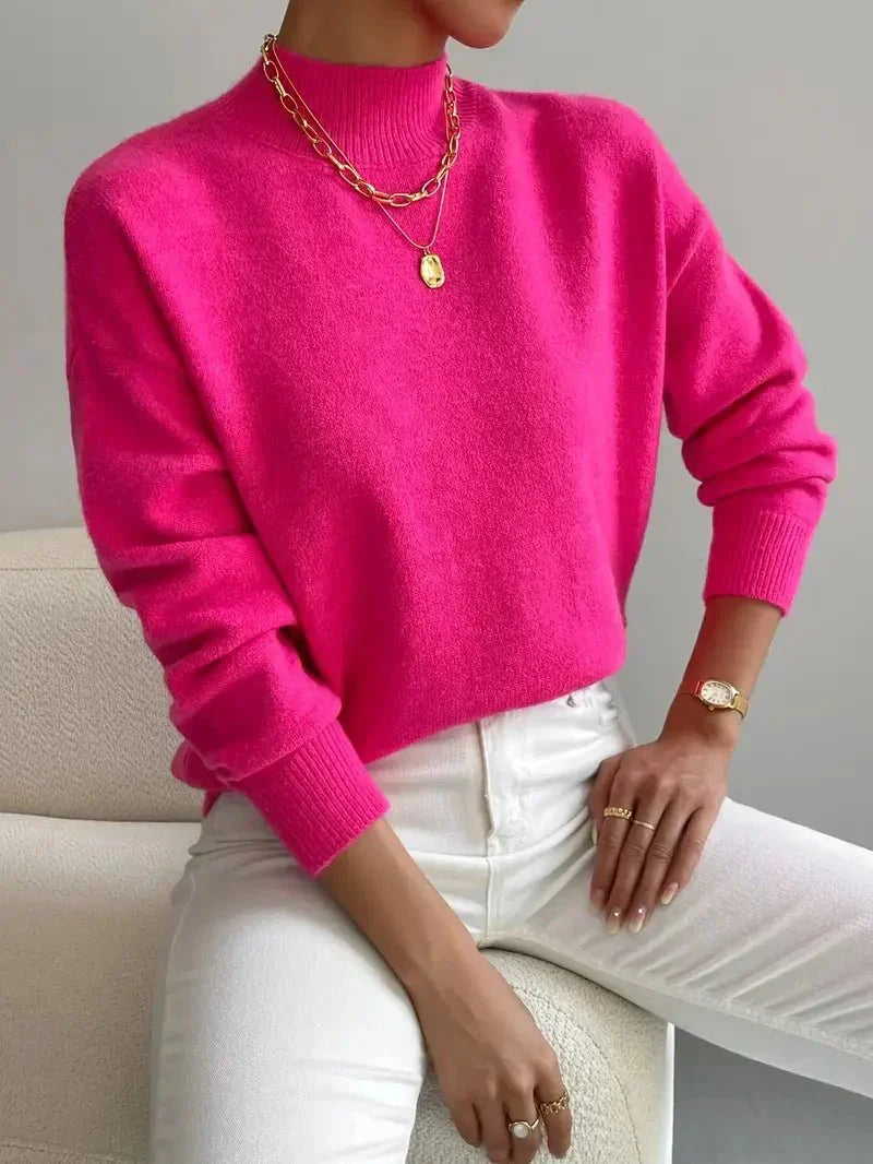 Turtleneck sweater for women in pink, three-quarter view of the collar and sleeves