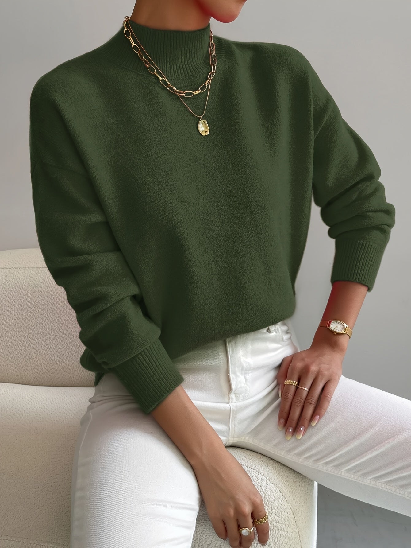 Turtleneck sweater for women in green, front view of the soft knit texture