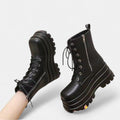 Black platform combat boot with chunky lug sole, side view