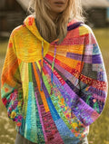 Patchwork print hoodie for women in multicolor, front view of the sunburst pattern