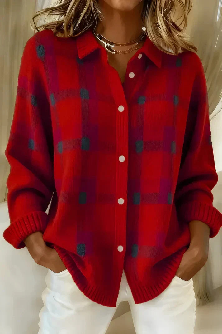 Red check cardigan seen straight on, full-length button placket