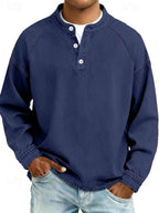 Close-up of the knit texture and button placket on the men's washed henley