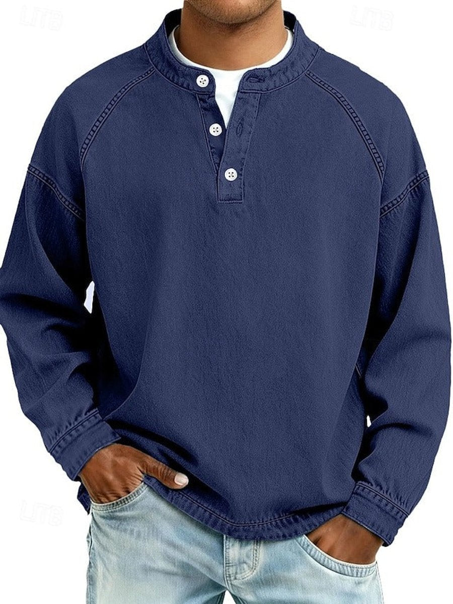 Close-up of the knit texture and button placket on the men's washed henley