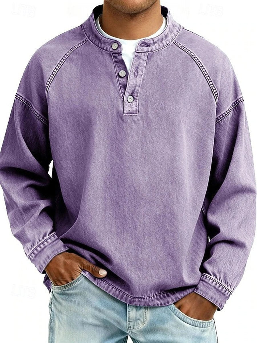 Men's long sleeve henley in purple, worn open at the neck