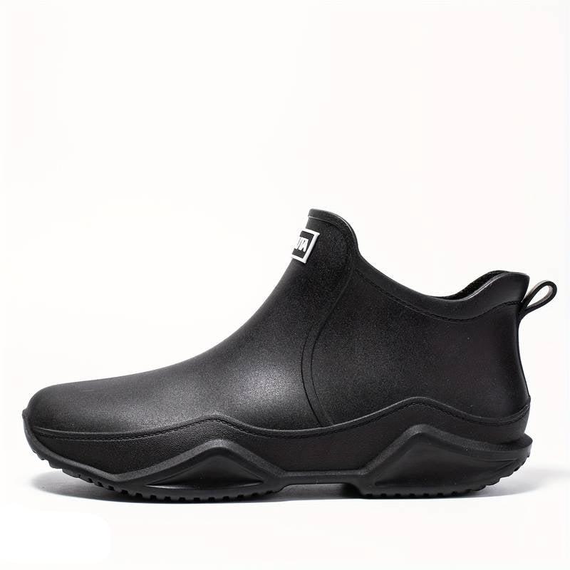 Black waterproof ankle rain boots for women, side view