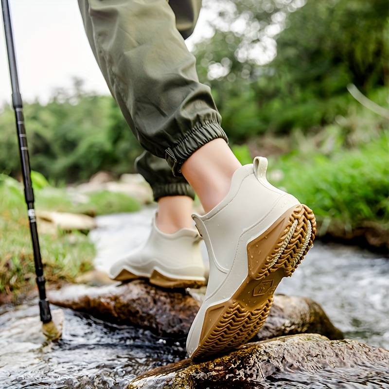 Waterproof rain boots for women worn on wet ground