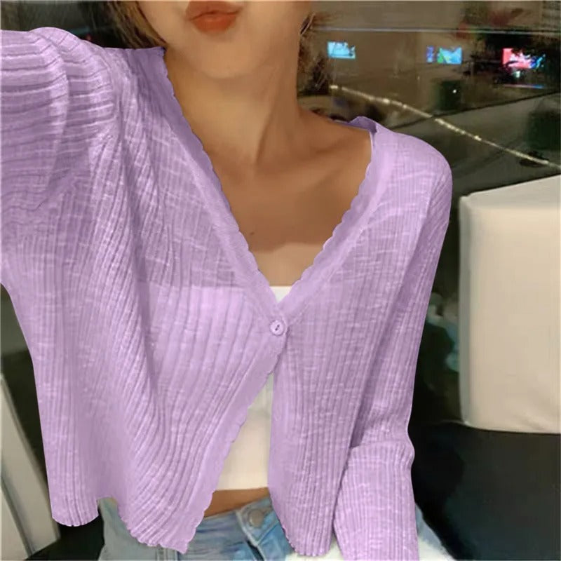 Purple ribbed knit cardigan buttoned all the way down