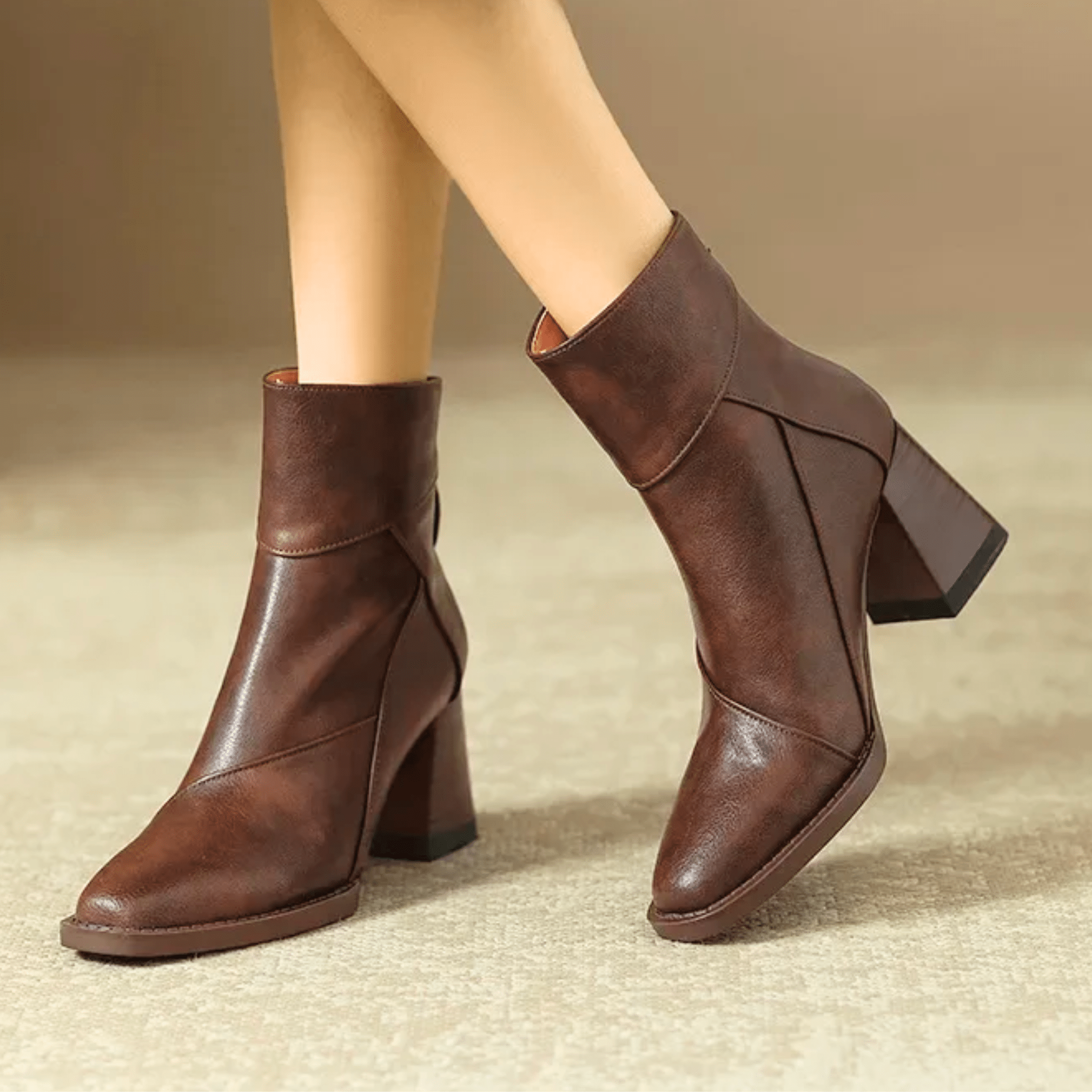 Leather block heel ankle boots — close view of the upper