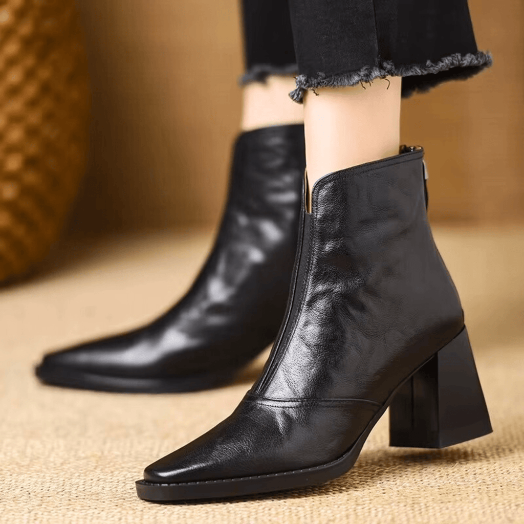 Heeled leather ankle boots — pair viewed from above