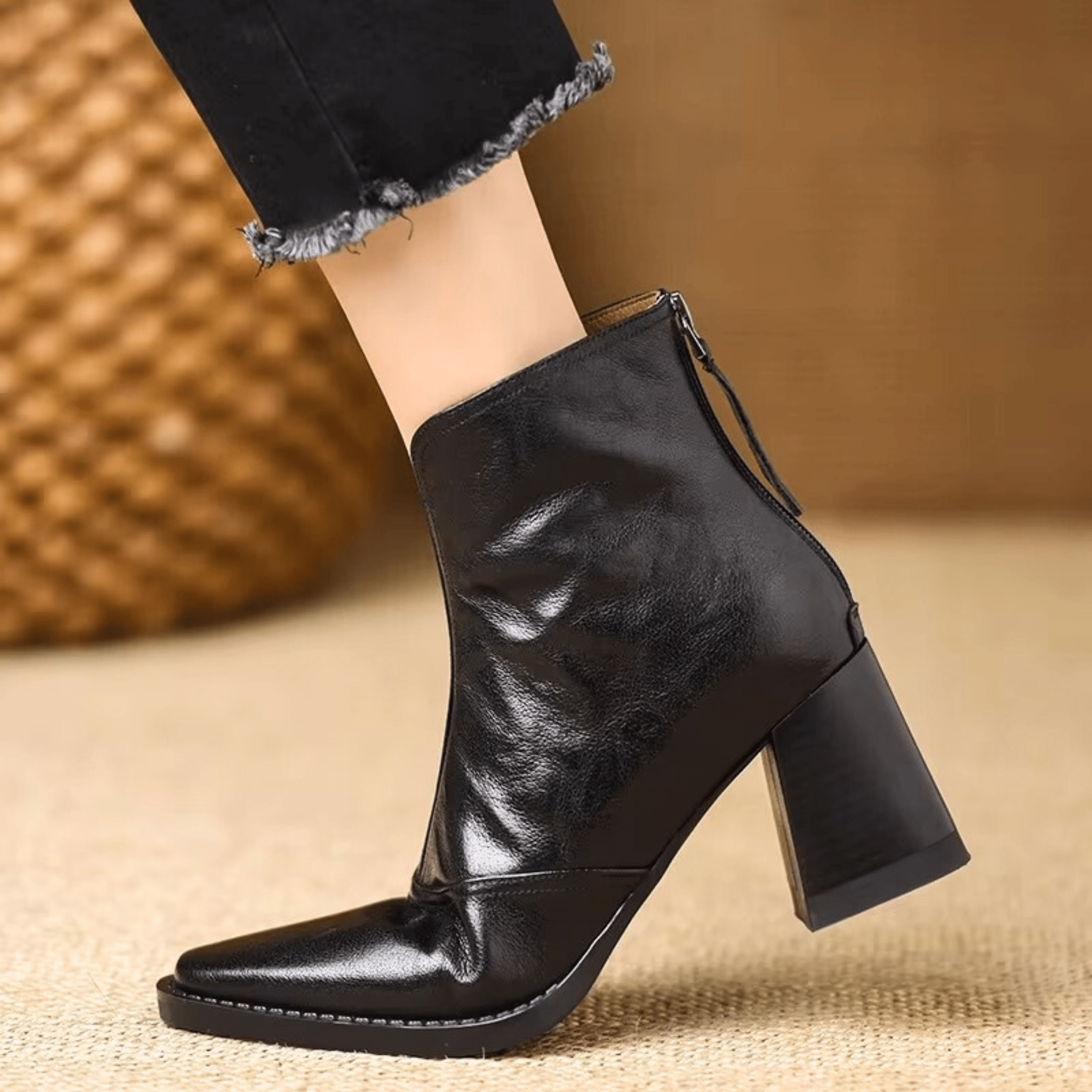Heeled leather ankle boots — shown in profile