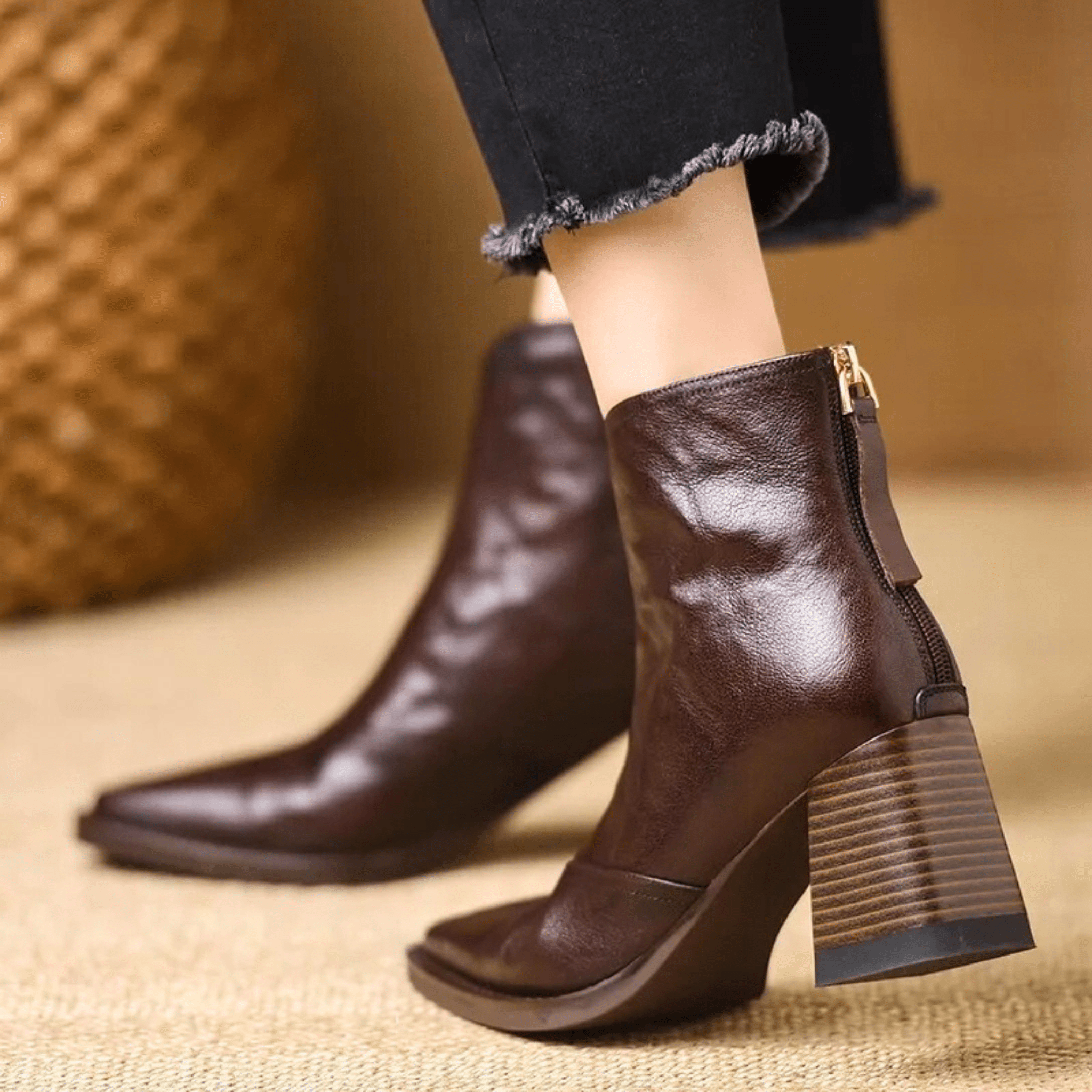 Heeled leather ankle boots — close view of the upper