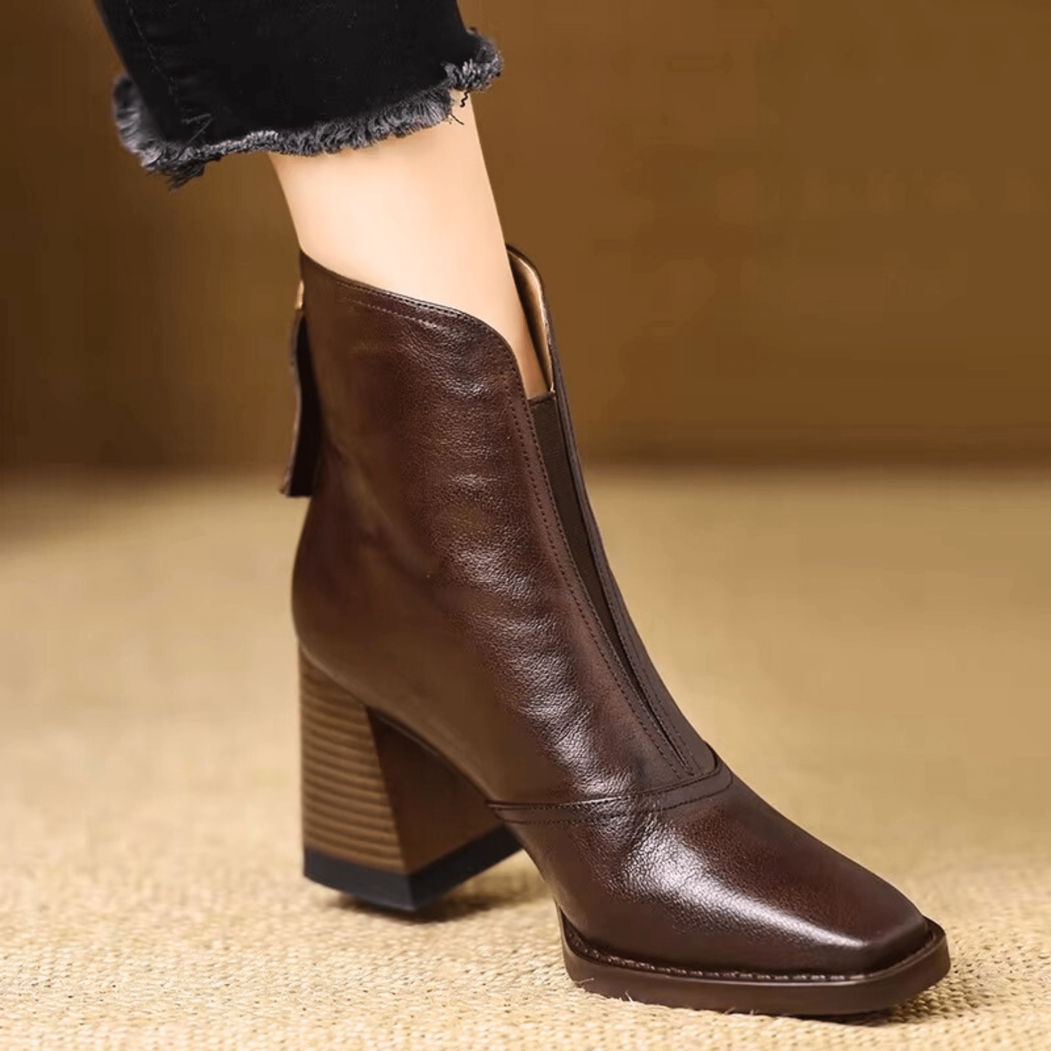 Heeled leather ankle boots in Espresso